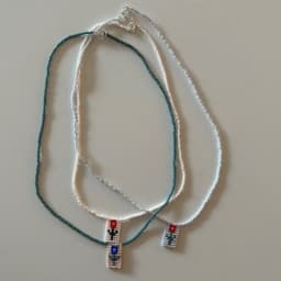 Museum Break : Pendentif fleur en perles tissées